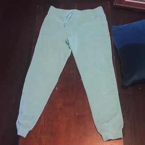 Two pairs is sweatpants one black one blue